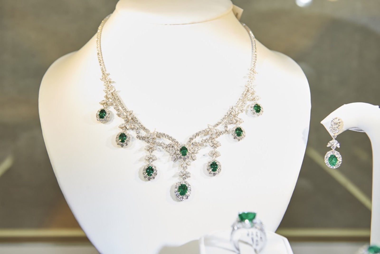An emerald and diamond necklace from the showroom collection