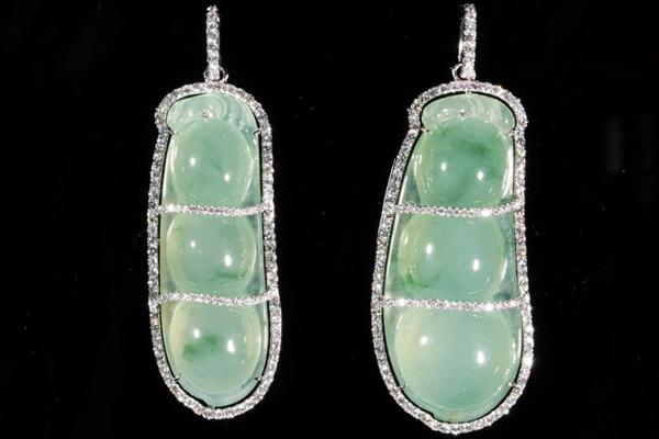 Green jadeite pods wrapped in ribbons of pavé diamonds.