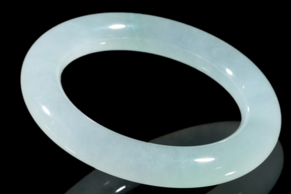 A bangle of icy jadeite, translucent and unadorned.